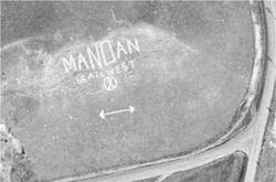 Aerial view of the Mandan Hill sign in 1961